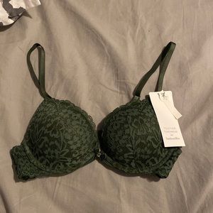 Unworn padded green bra